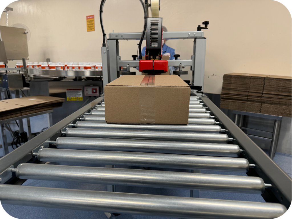 a box going down a conveyor belt