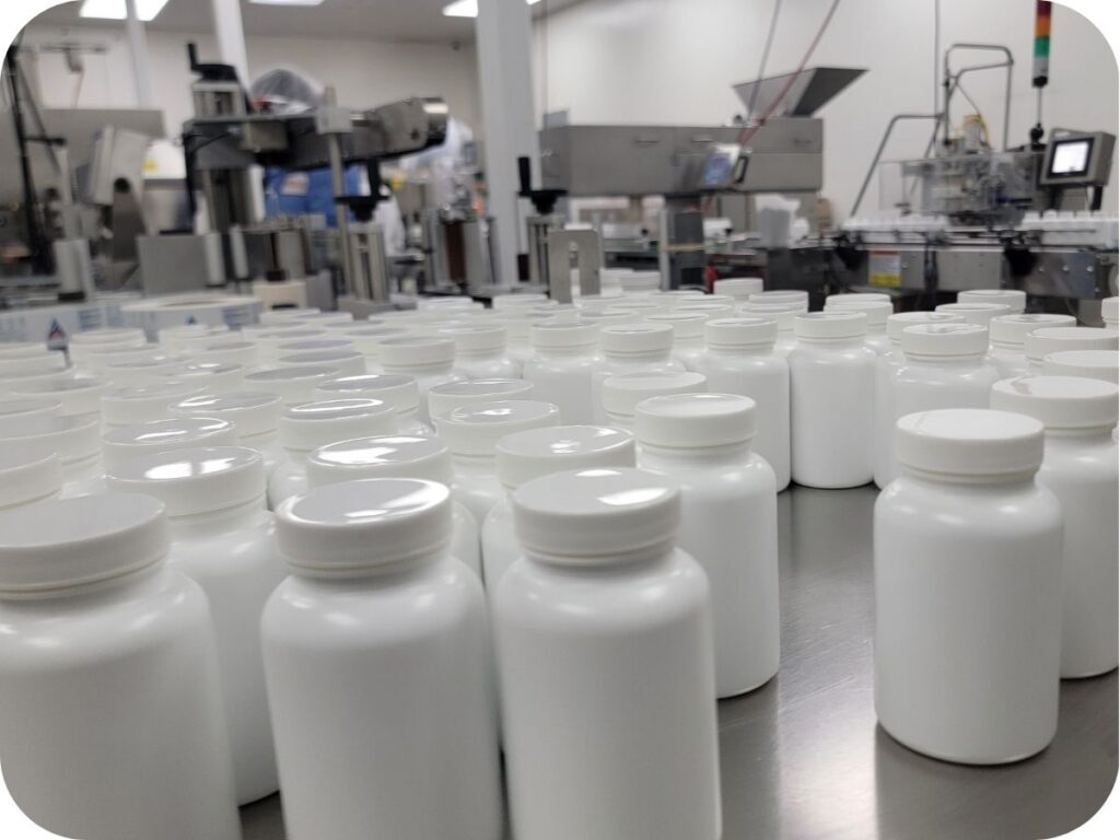table with bottles and lids