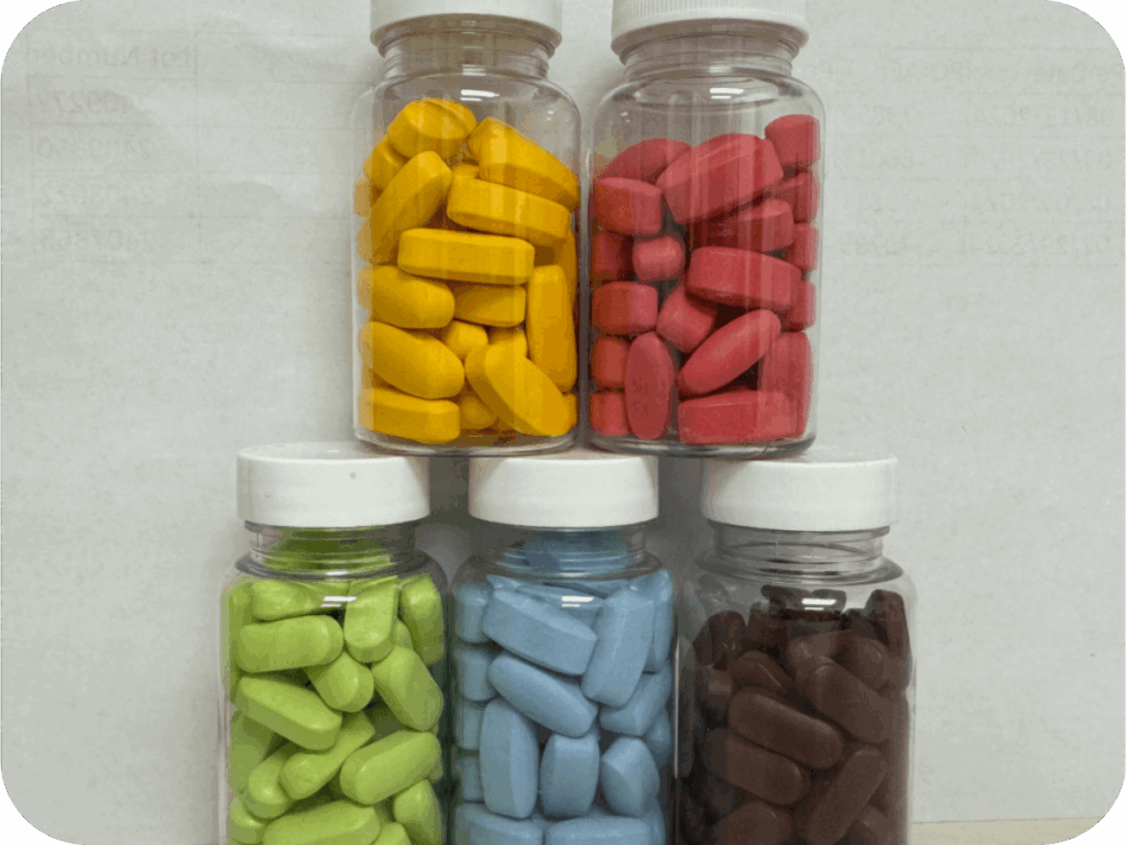 color coated pharmaceutical tablets in bottles