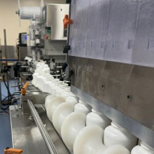 Lots of blank containers being packed